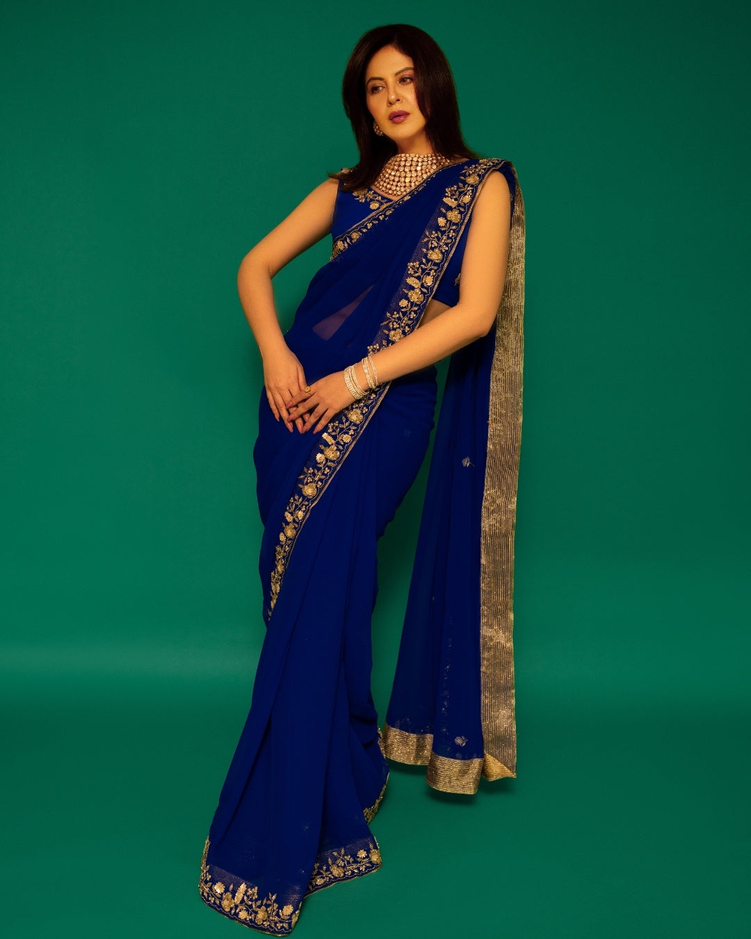 Royal Blue Hand Embroidered Georgette Saree and Matching Floral Embroidered Blouse