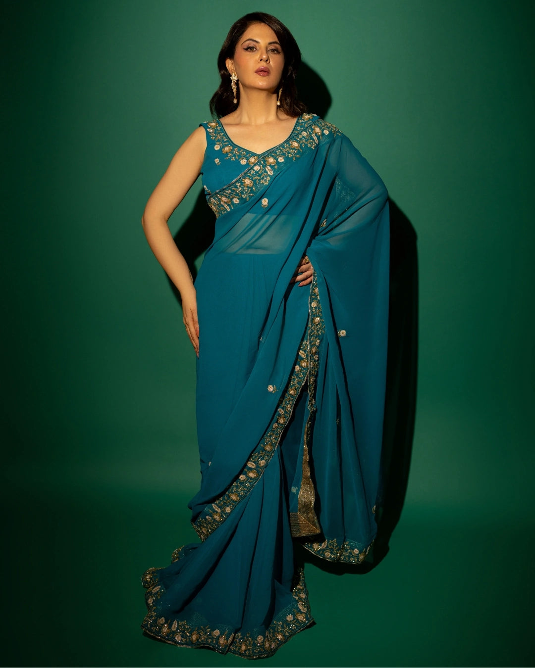 Peacock Blue Hand Embroidered Georgette Saree and Matching Floral Embroidered Blouse