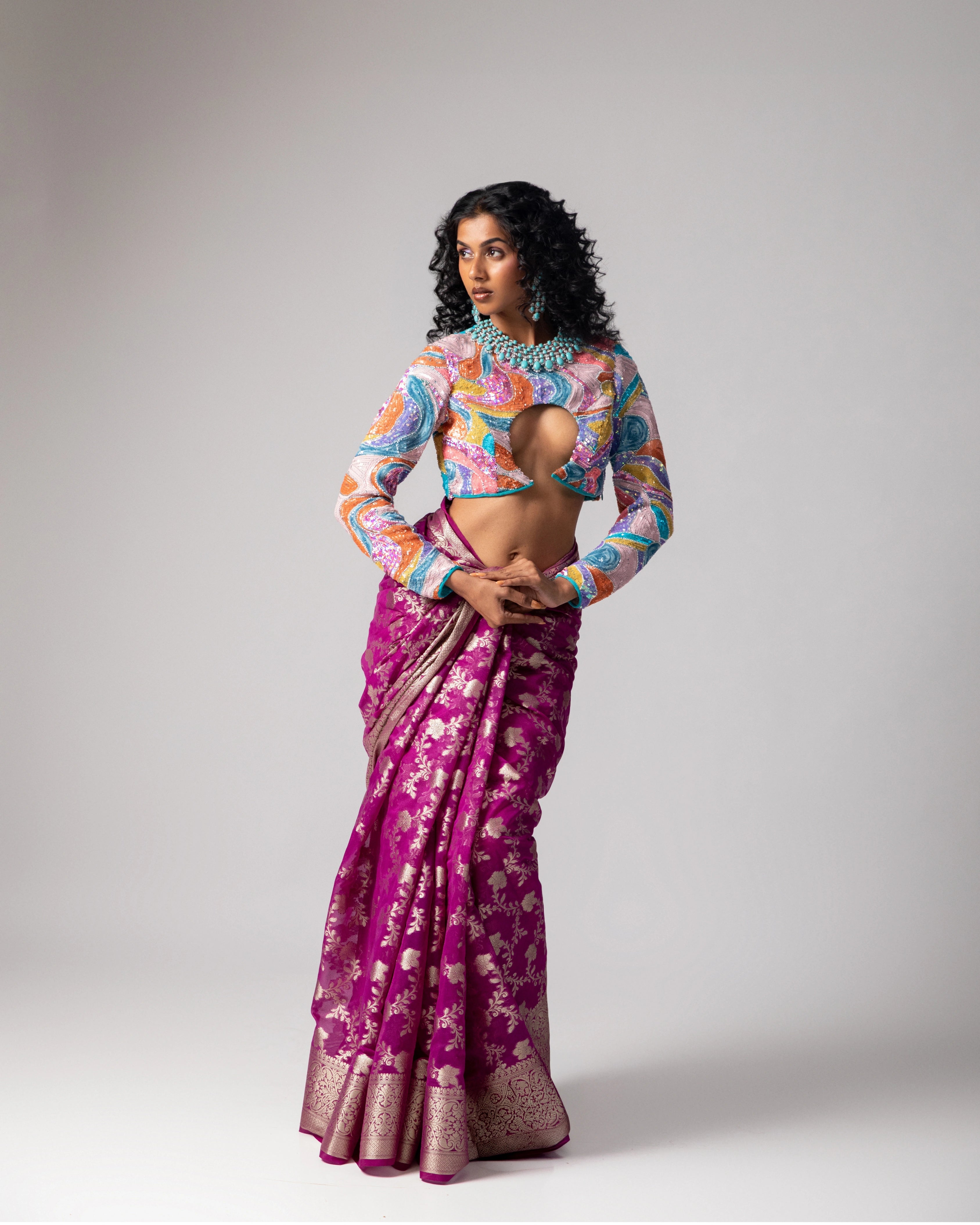 Pink Banarasi Saree with Gold Floral Design and Multicolor Full Sleeve Cut-Out Blouse