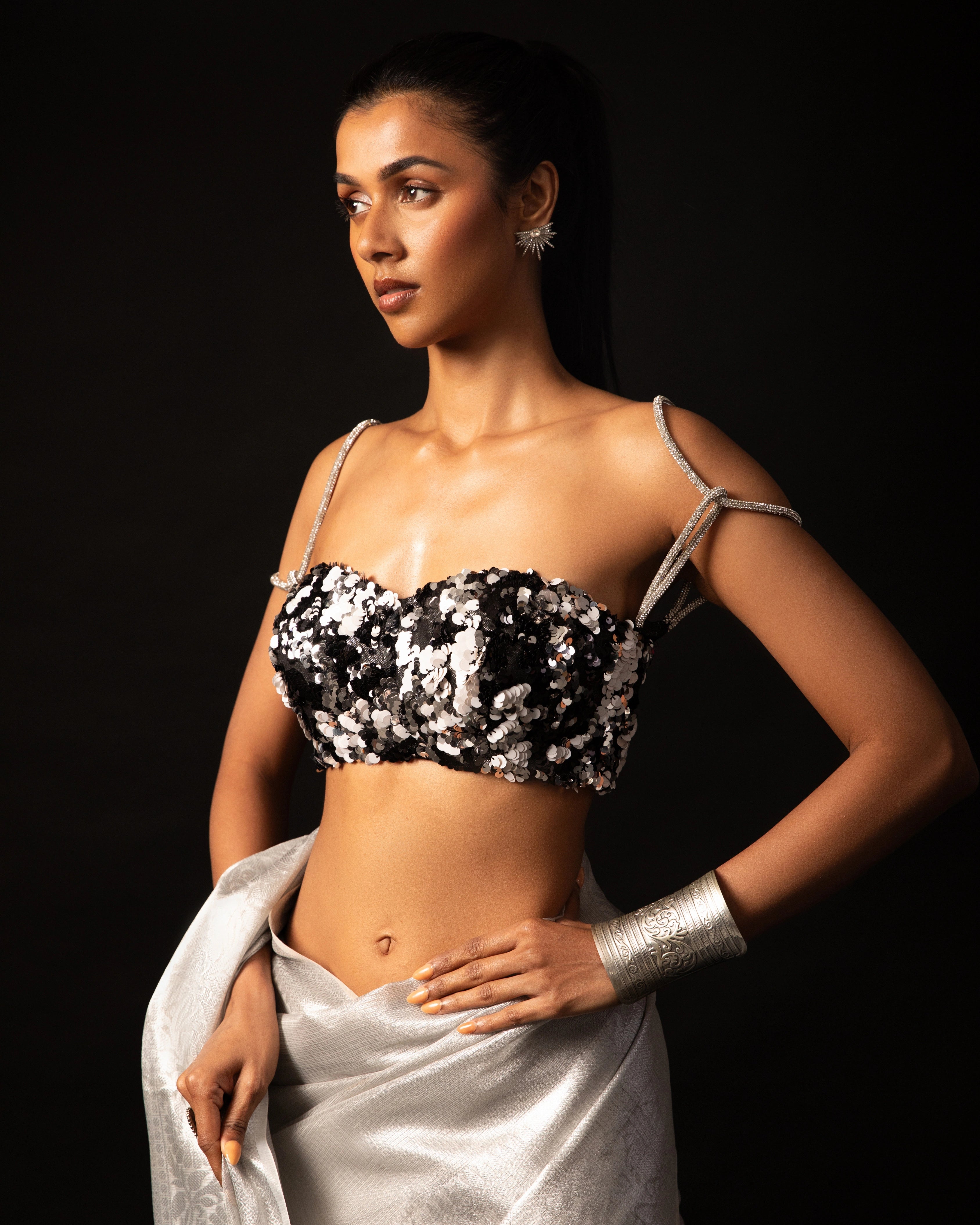 White Banarsi Silk Blend Metallic Tone Saree with Handwoven Border and Black Floral Sequin Blouse