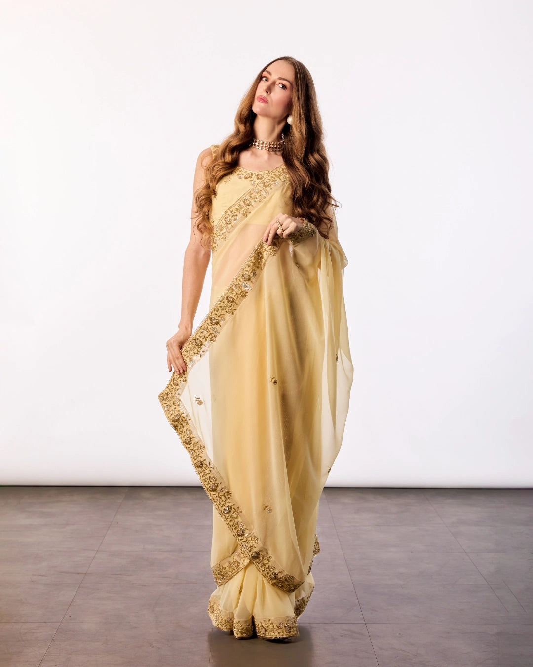 Yellow Hand Embroidered Georgette Saree and Matching Floral Embroidered Blouse