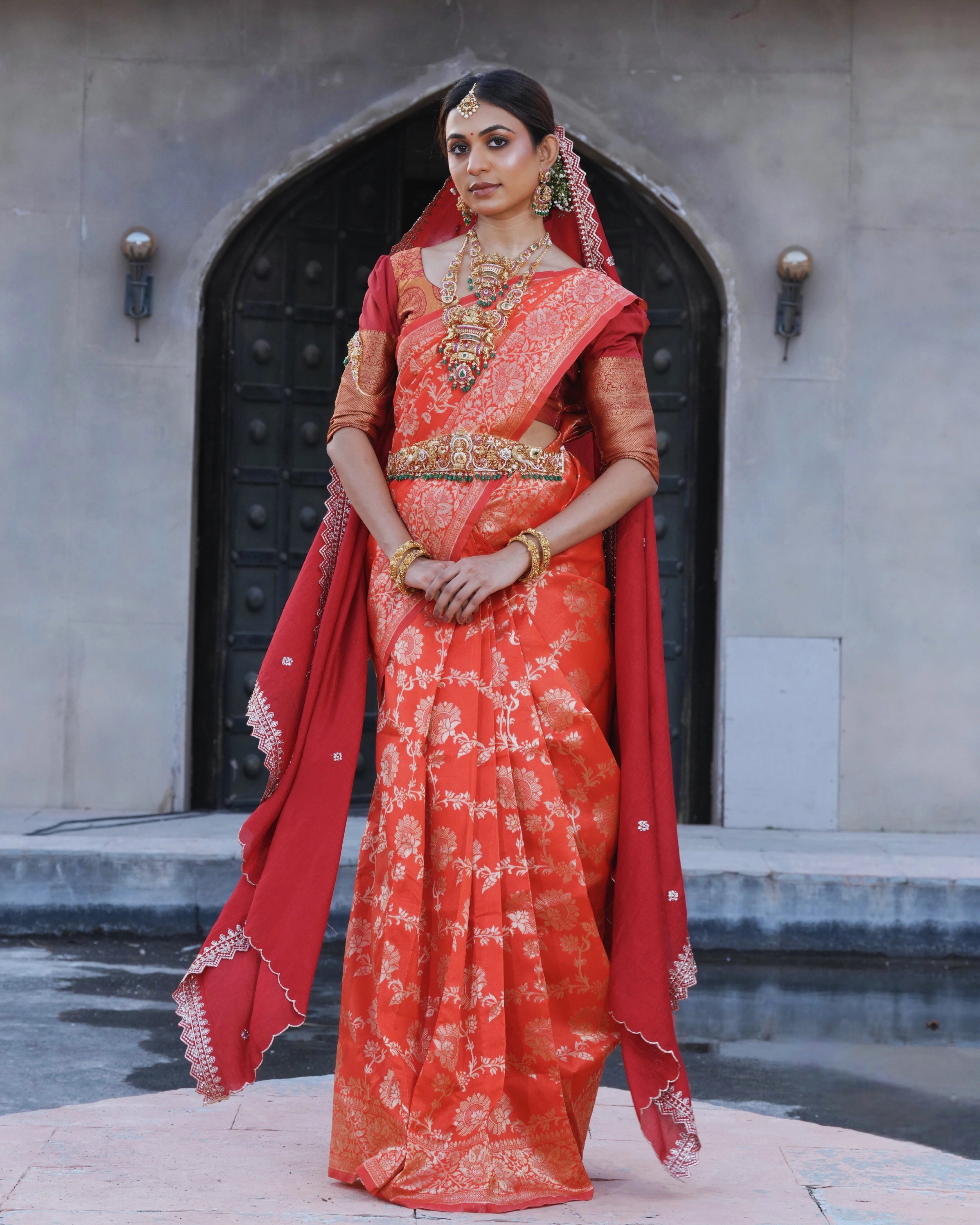 Orange Silk Saree with All-over Golden Zari Floral Weaving with Matching Blouse
