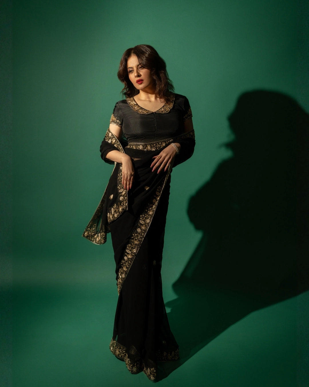 Black Hand Embroidered Georgette Saree and Matching Floral Embroidered Blouse