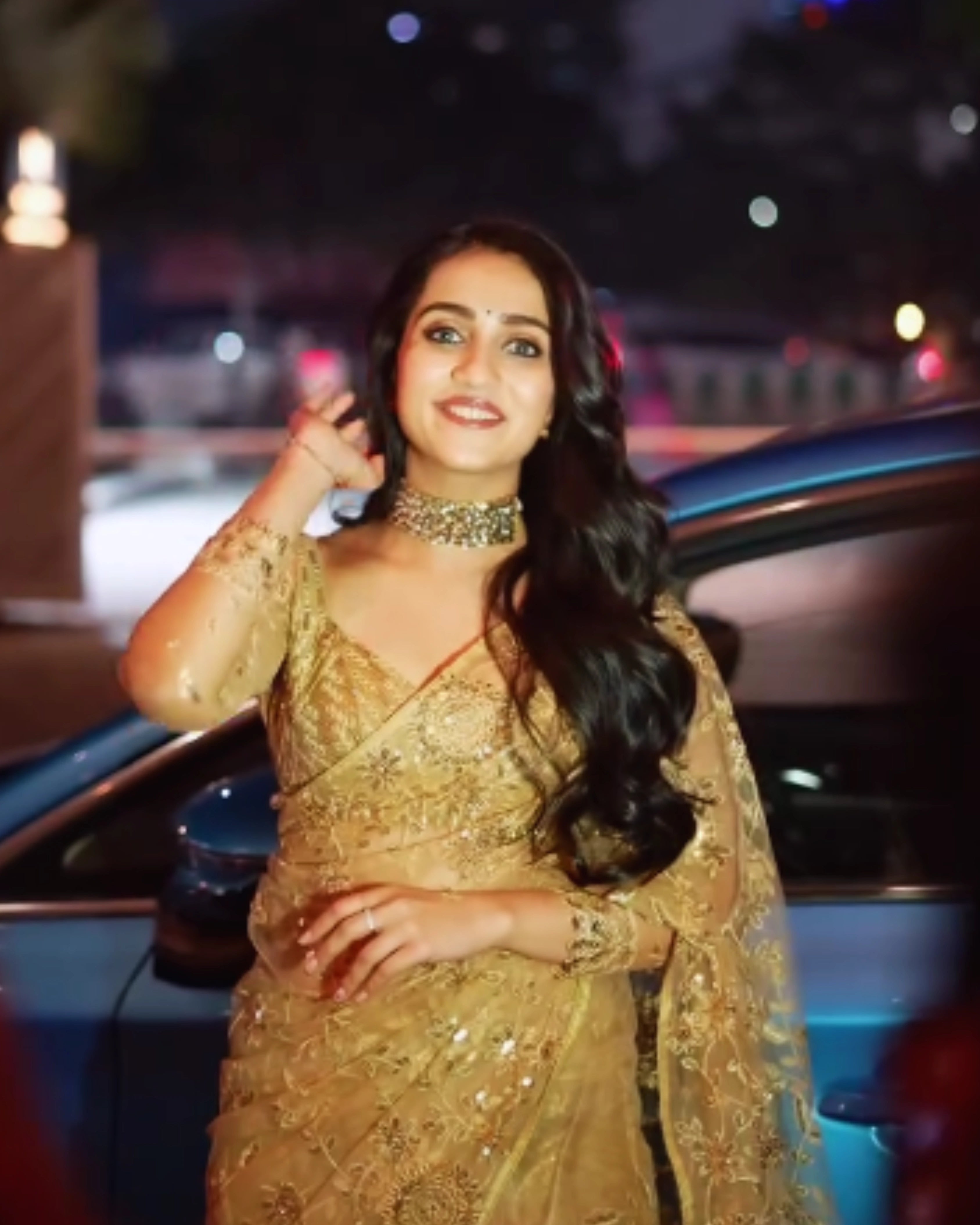 Gold Shimmer Sequin Net Saree with All Over Floral Thread Work and Full Sleeves Silk Blouse