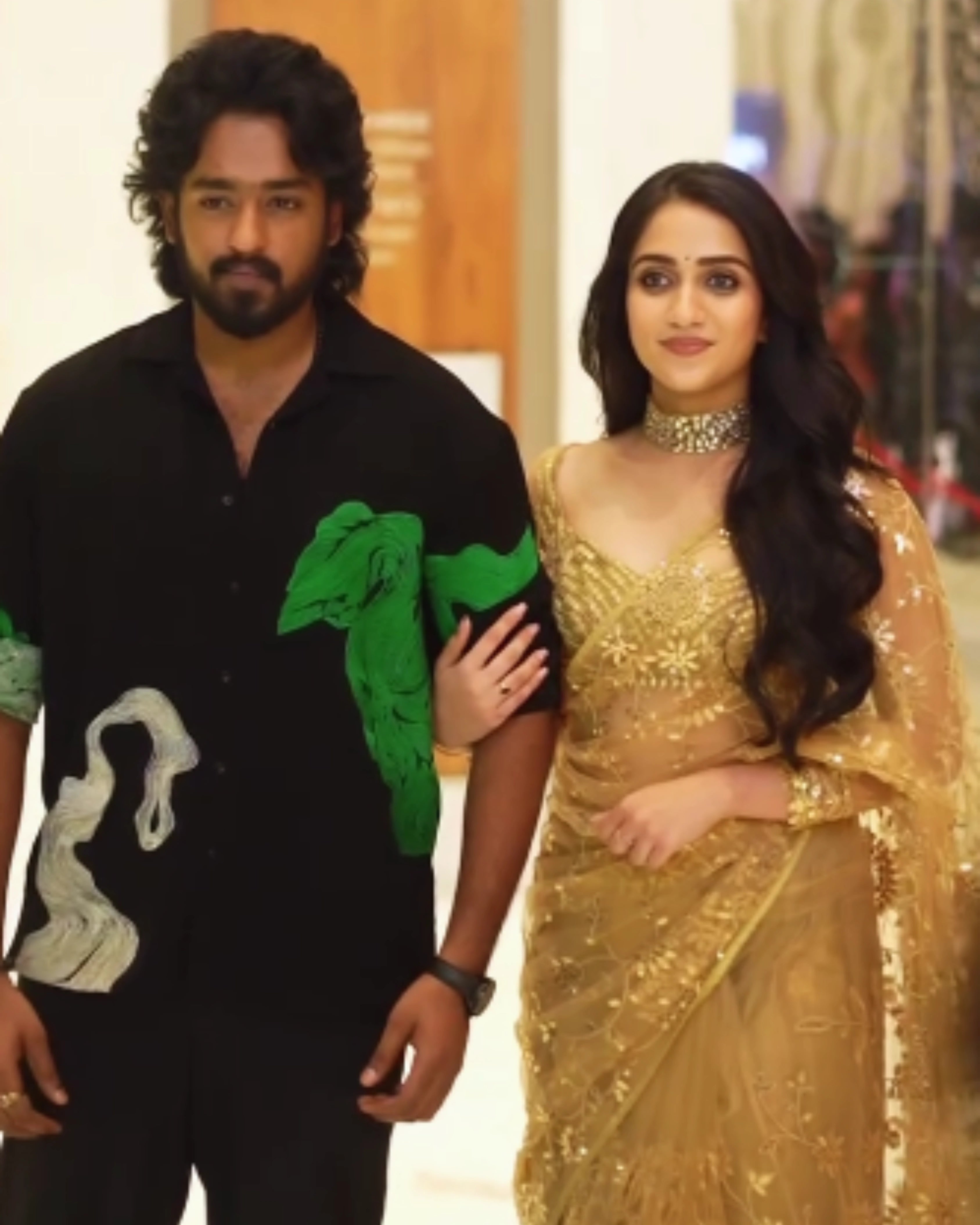 Gold Shimmer Sequin Net Saree with All Over Floral Thread Work and Full Sleeves Silk Blouse