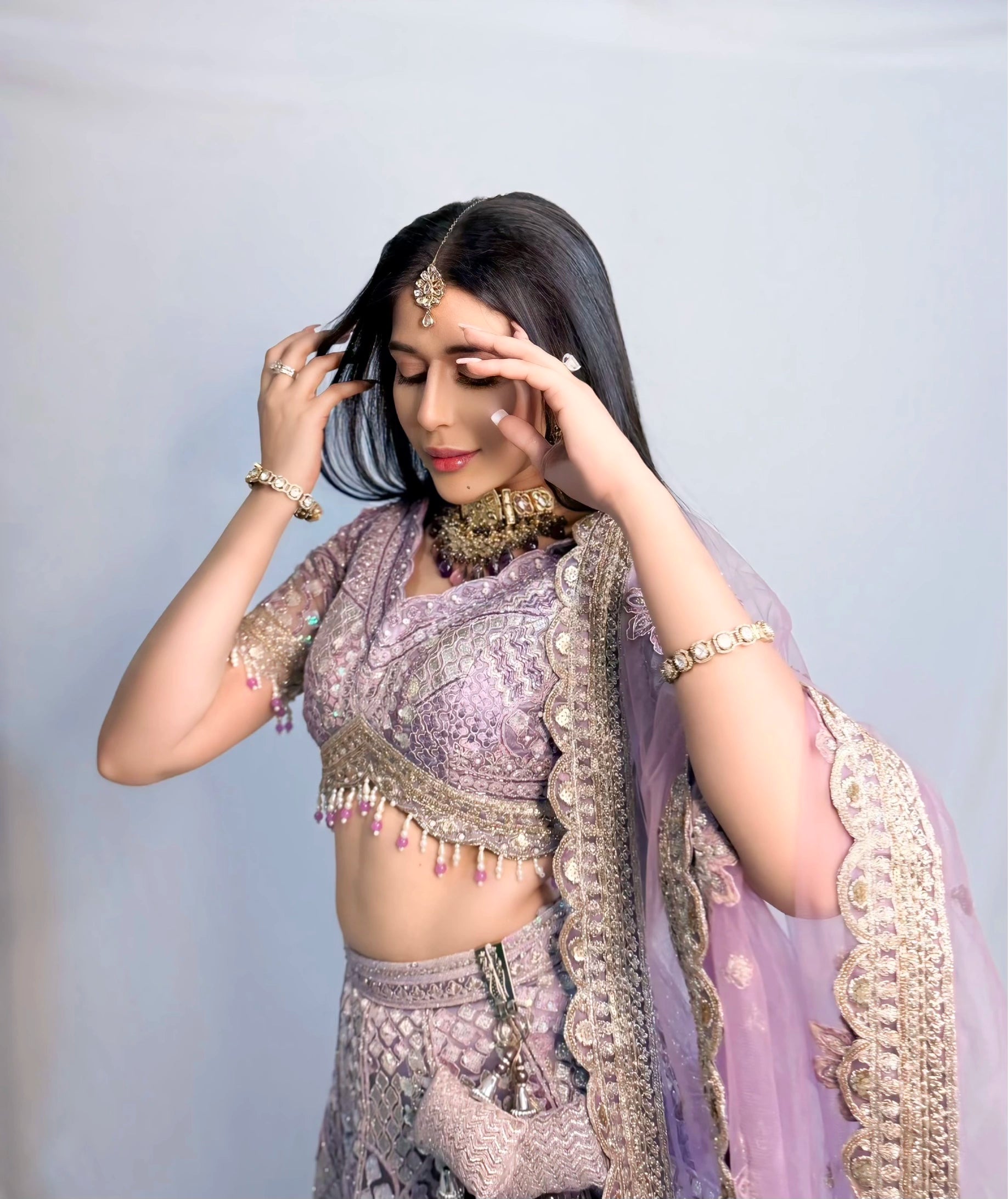 Lavender Silk Lehenga with Floral Embroidery Mirror Stonework and Gold Zari Border Work