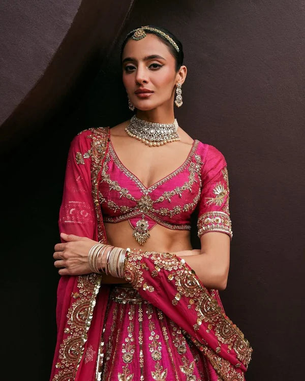 Magenta Pink Bridal Silk Lehenga with Heavy Zari Embroidery, Stone Work, and Royal Motif Design