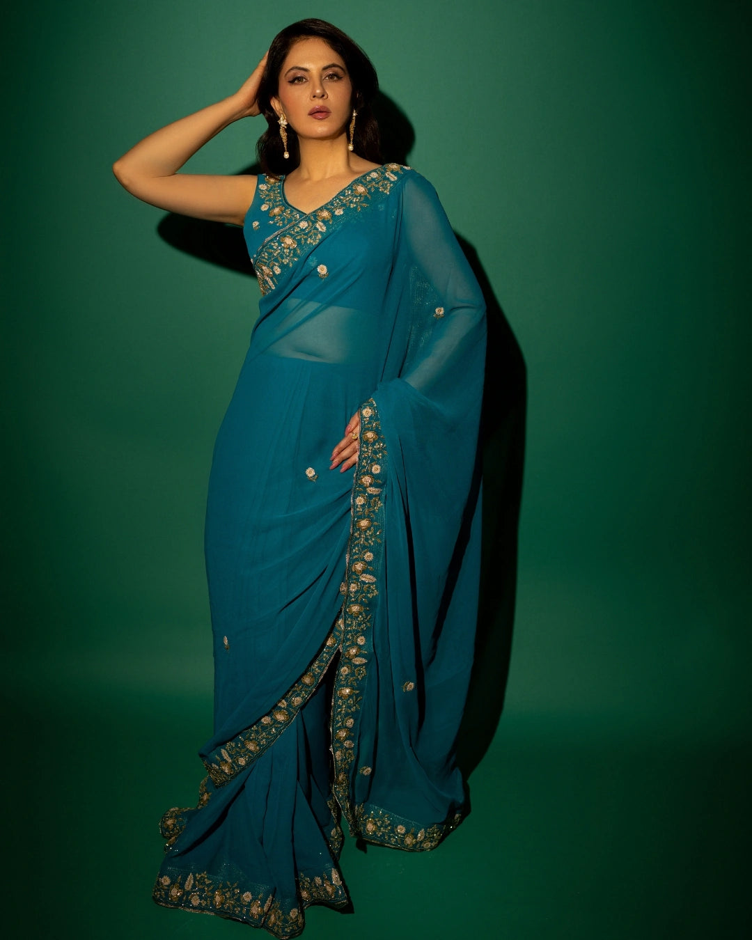 Peacock Blue Hand Embroidered Georgette Saree and Matching Floral Embroidered Blouse