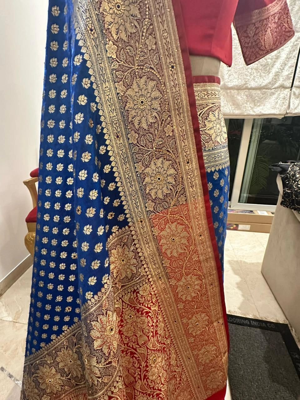 Royal Blue Pure Banarasi Silk Saree with Gold Zari Border and Red Zari-Detailed Sleeve Blouse