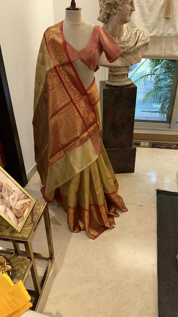 Gold Pure Banarasi Silk Saree with Maroon Zari Border Design and Maroon Hand-Embroidered Blouse