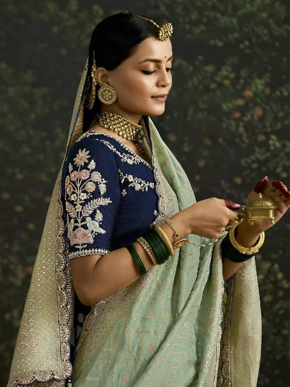 Mint Green Heavy Silk Saree with Gold Zari and Embroidery Work All-Over & Heavy Embroidery Navy Blue Blouse