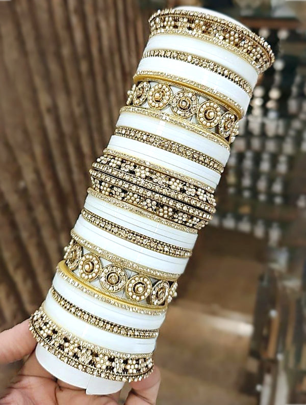 White Bangles with Golden Highlights & Zarkan Stone Embellishments - Nonita Fashion