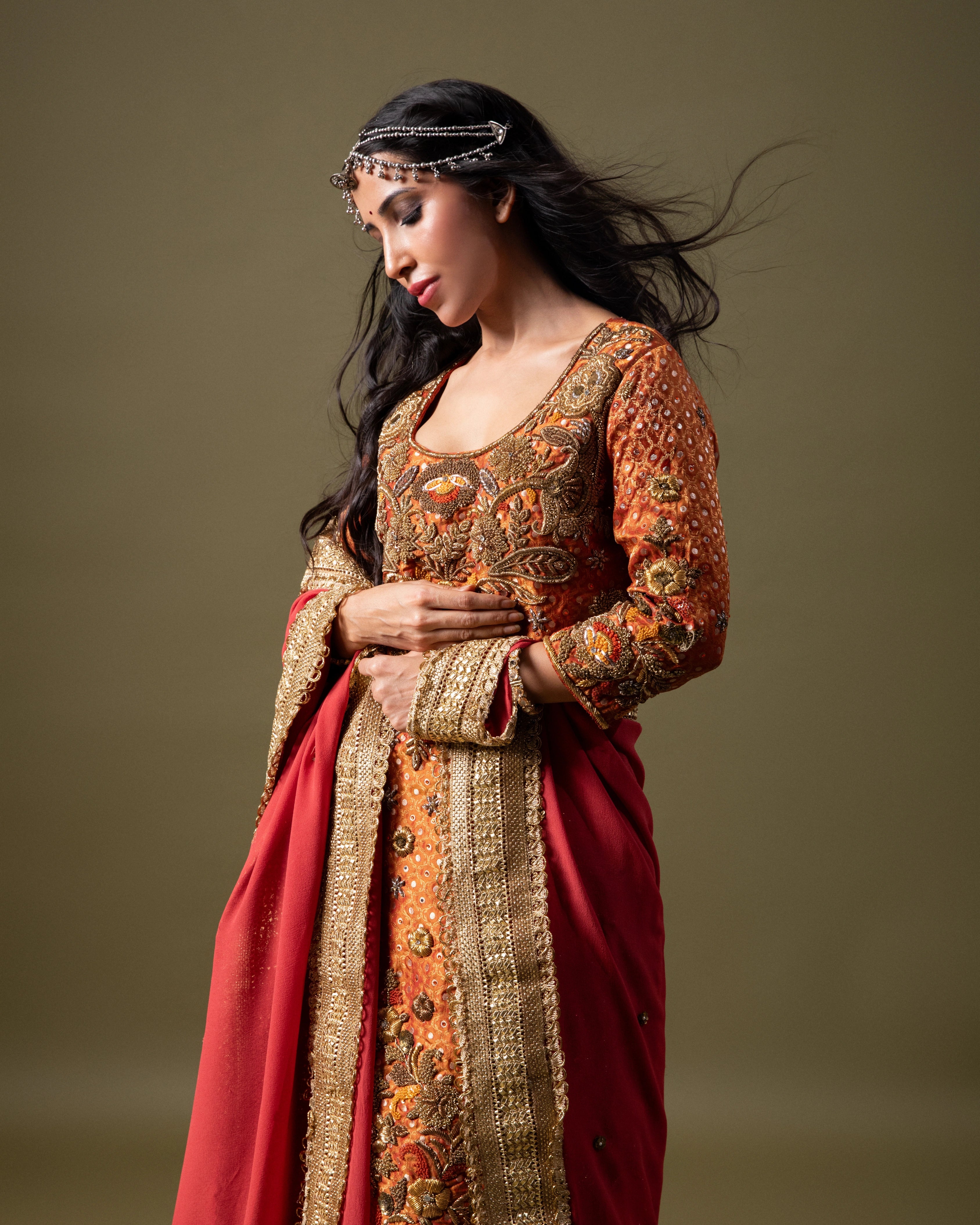 Orange Silk Kurta with Plain Blue Silk Lehenga and Matching Orange Dupatta with Lace Border