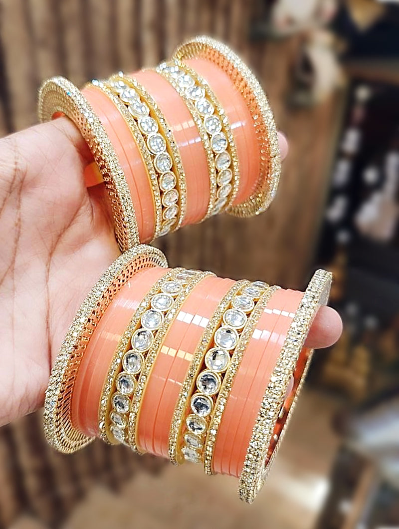 Gorgeous Peach Chooda with Golden Embellishments and Stone Accents - Nonita Fashion