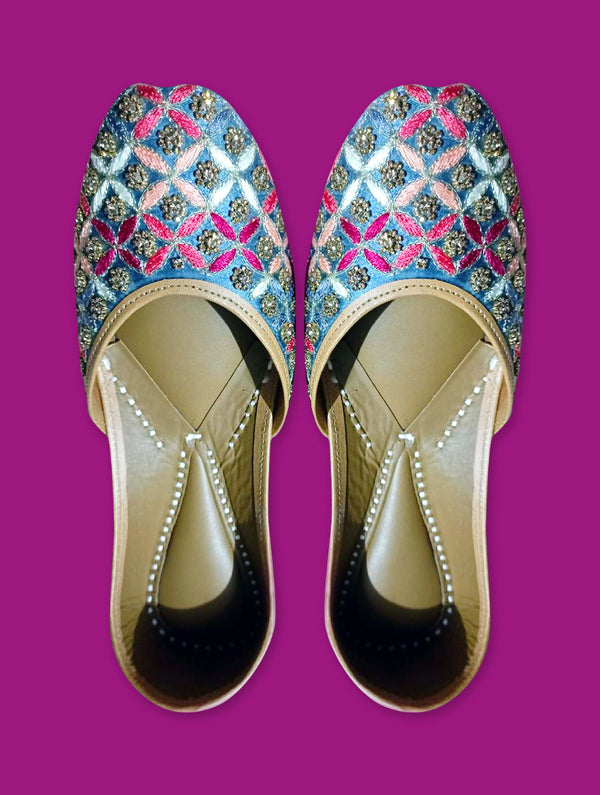 Blue Jutti featuring exquisite pink and blue thread work - Nonita Fashion