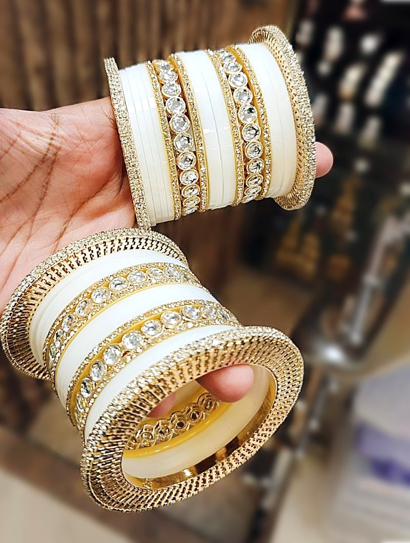 Stunning Cream Chooda with Golden Embellishments and Stone Accents - Nonita Fashion