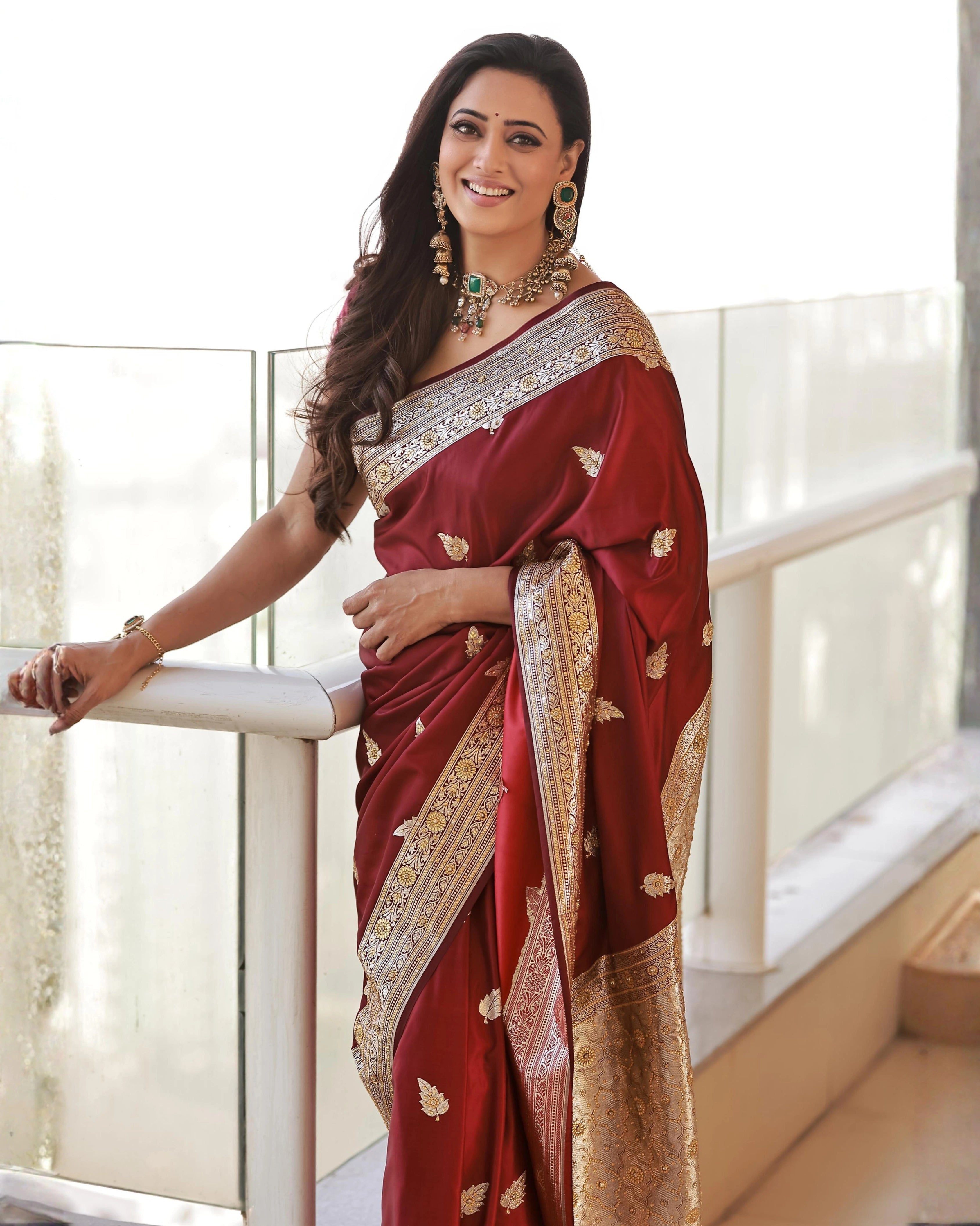 Maroon Pure Banarasi Silk Saree with All-Over Gold Zari Border Floral Leaf Design and Matching Blouse