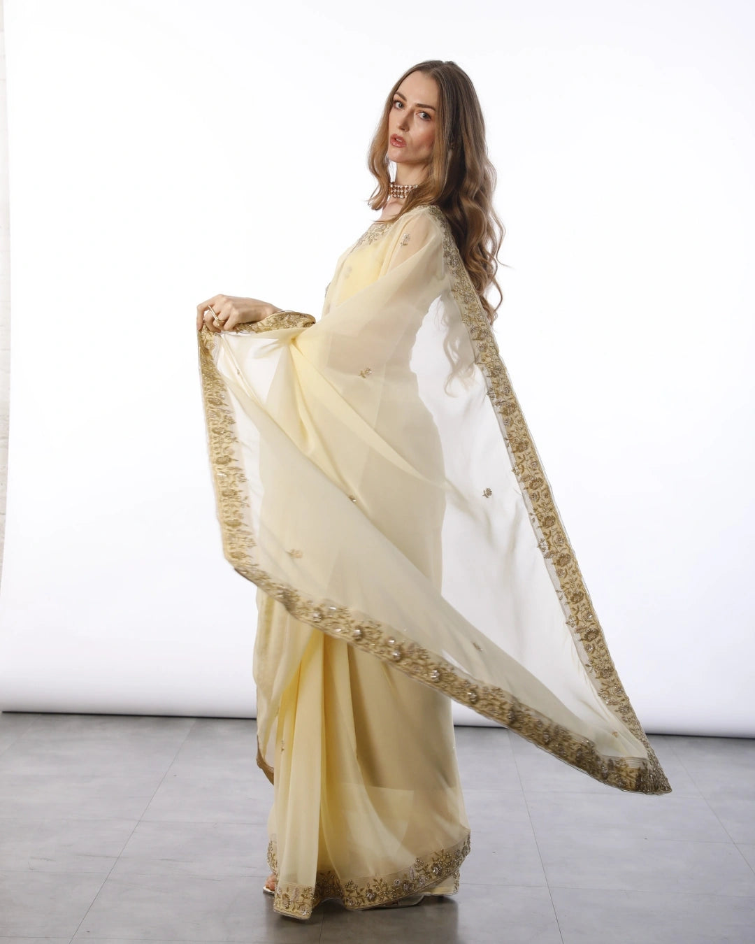 Yellow Hand Embroidered Georgette Saree and Matching Floral Embroidered Blouse