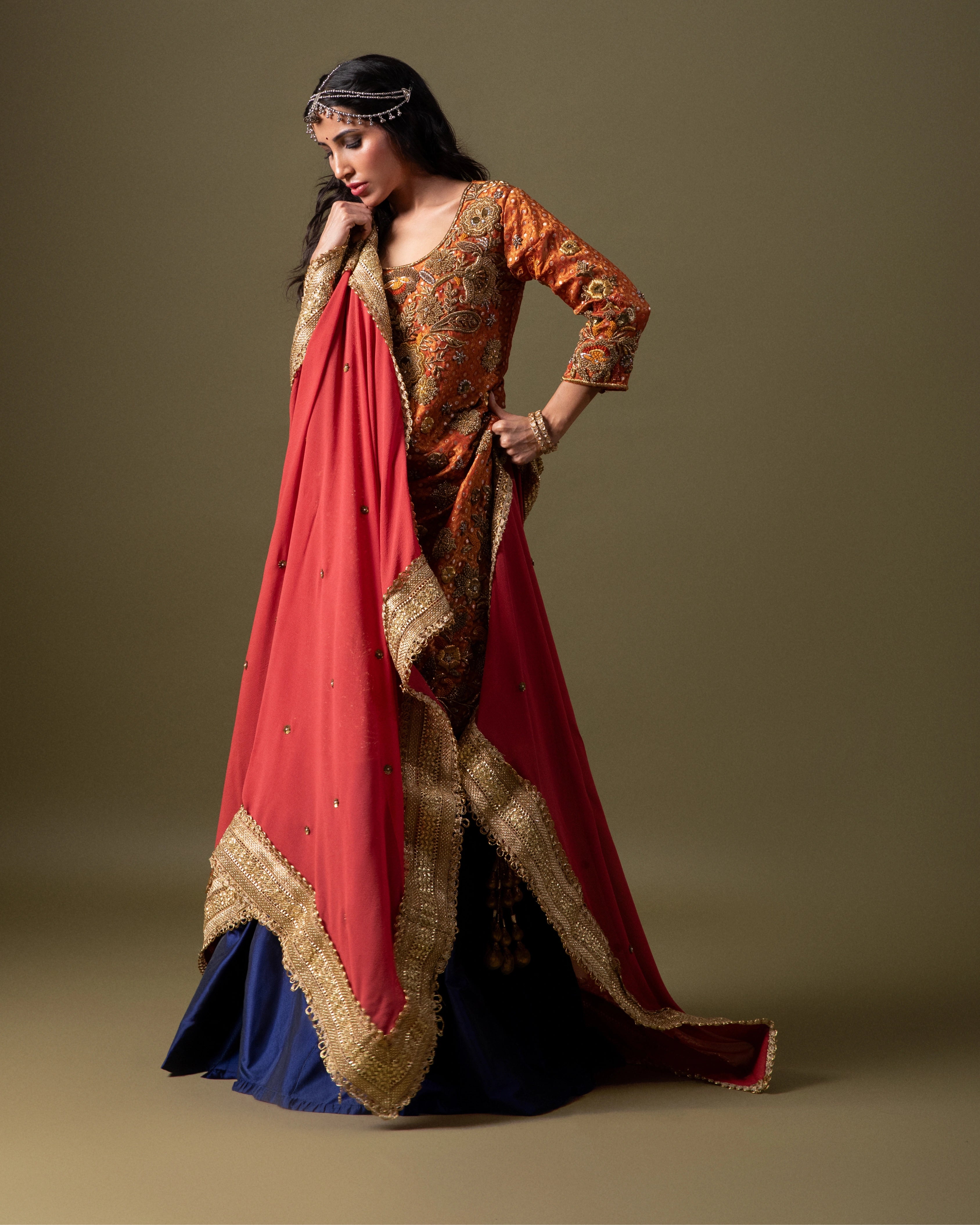 Orange Silk Kurta with Plain Blue Silk Lehenga and Matching Orange Dupatta with Lace Border