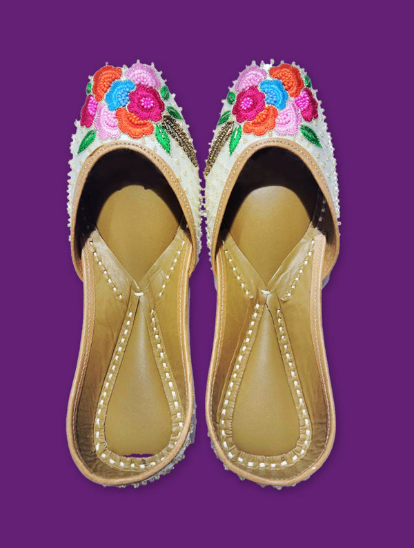 White Jutti with Multicolor Floral Elegance - Nonita Fashion