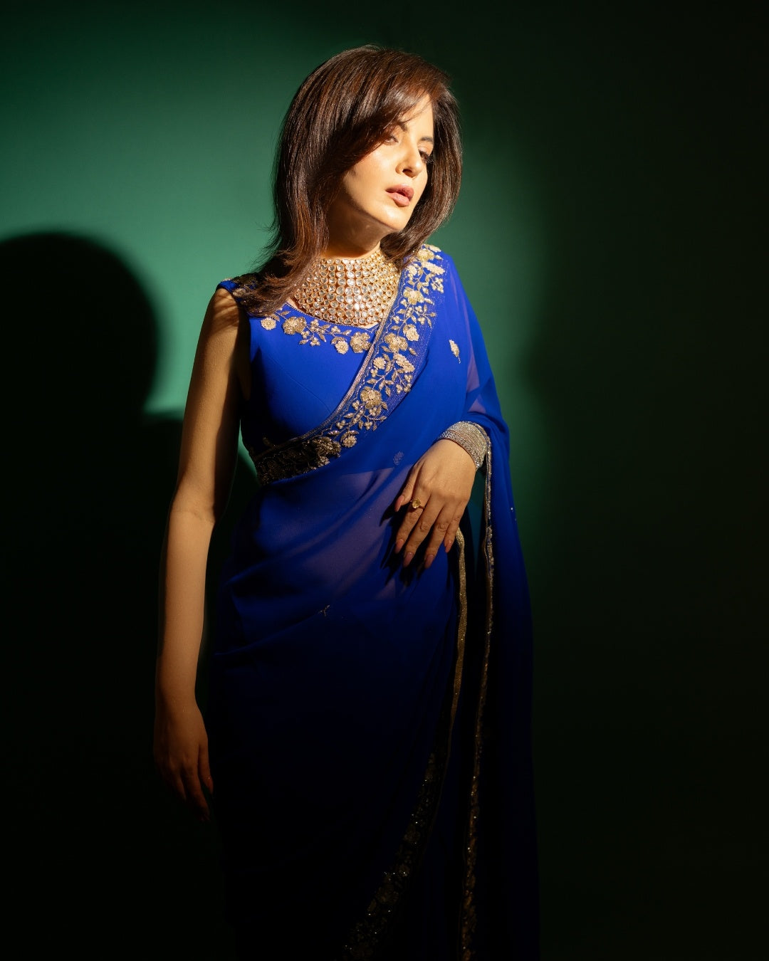 Royal Blue Hand Embroidered Georgette Saree and Matching Floral Embroidered Blouse