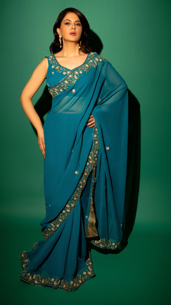 Peacock Blue Hand Embroidered Georgette Saree and Matching Floral Embroidered Blouse