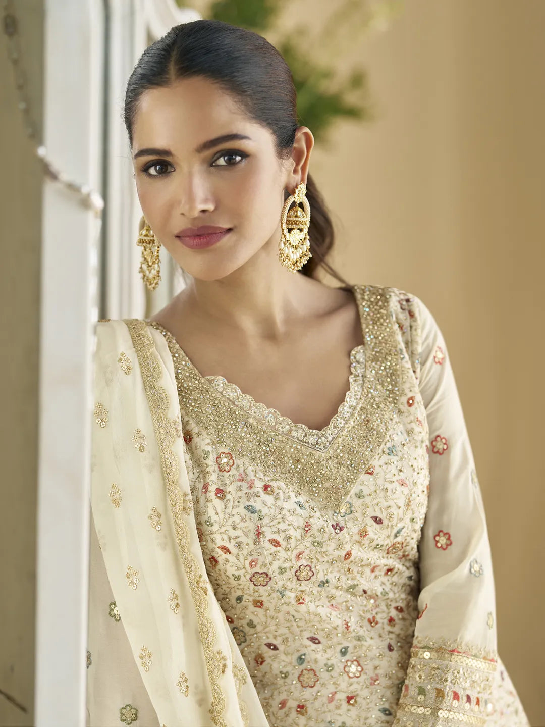 Beige Georgette Sharara with All Over Multi Colored Threads Embroidery and Golden Zari work
