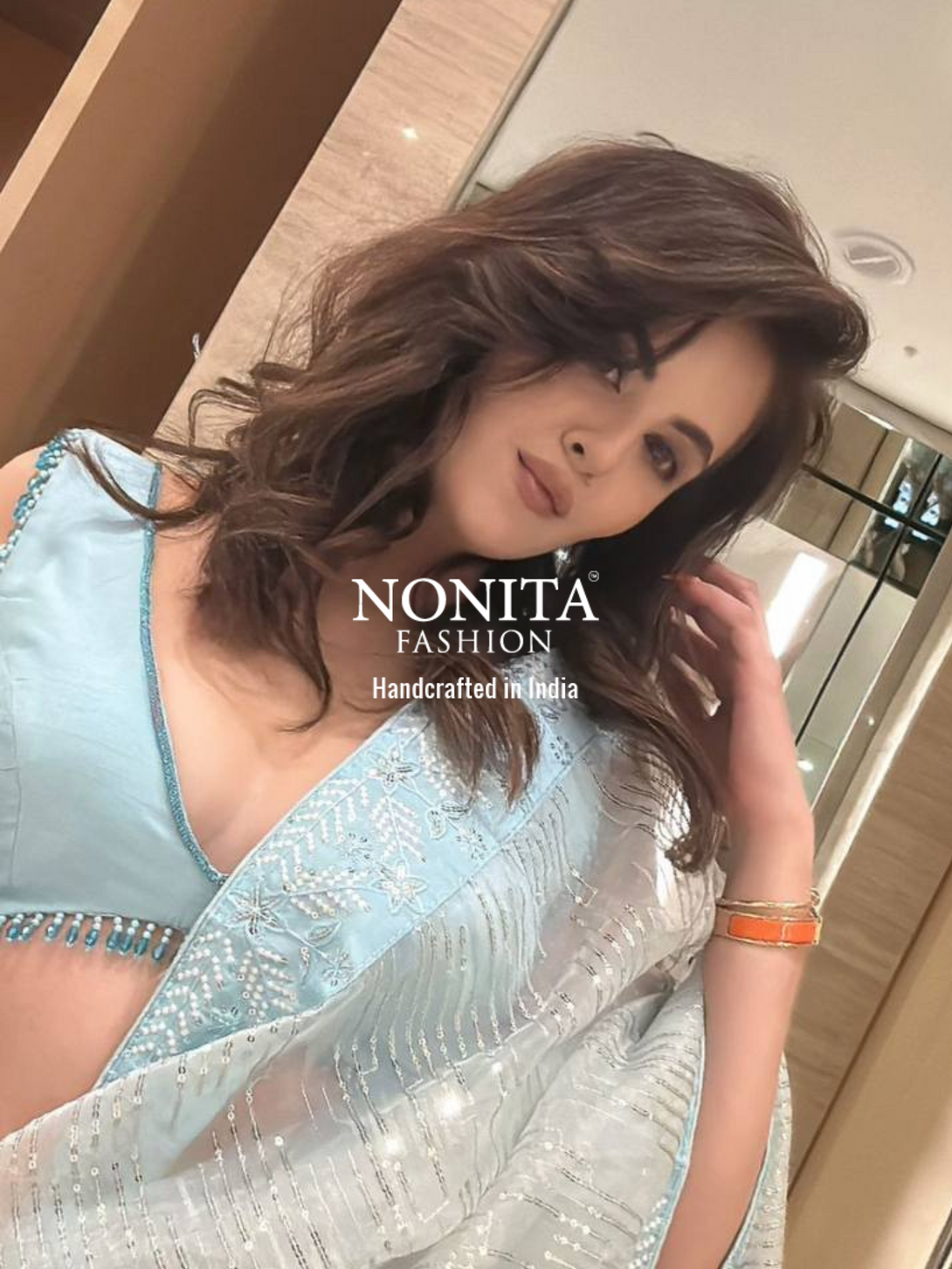 Blue Organza Saree with Embroidery Sequin Work and Lace Border
