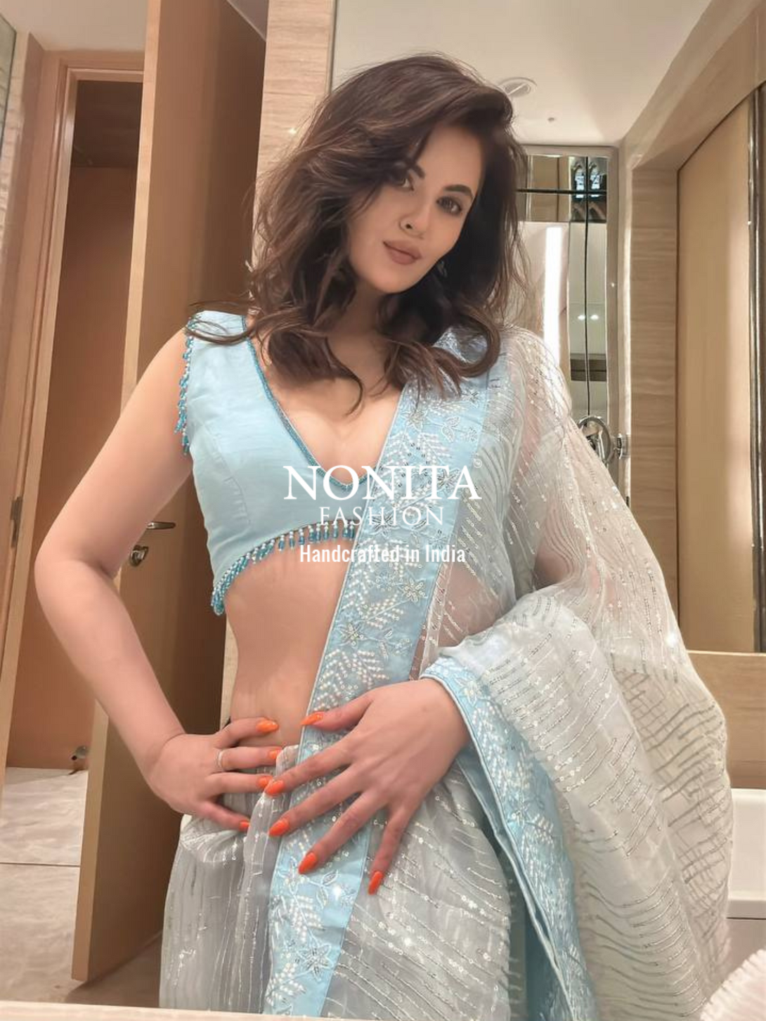 Blue Organza Saree with Embroidery Sequin Work and Lace Border
