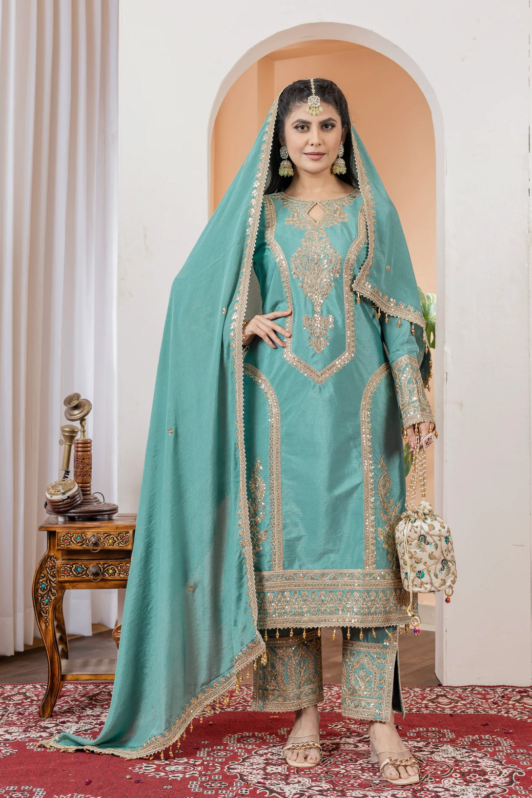 Blue Silk Salwar Kameez showcasing Embroidery and Motifs with Coding Dori Work
