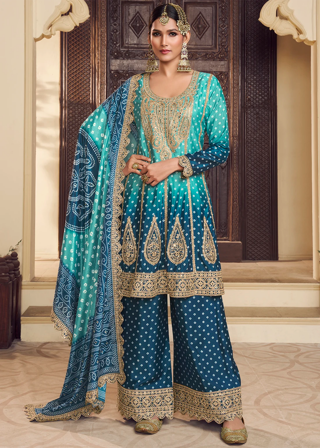 Blue Silk Salwar Kameez with Intricate Motifs Design and Heavy golden thread embroidery Work
