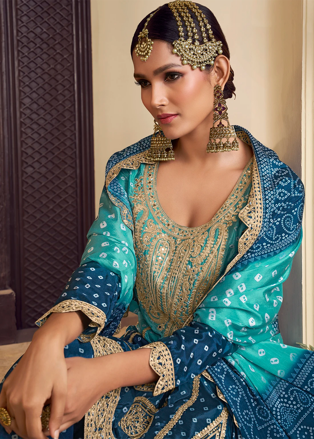 Blue Silk Salwar Kameez with Intricate Motifs Design and Heavy golden thread embroidery Work
