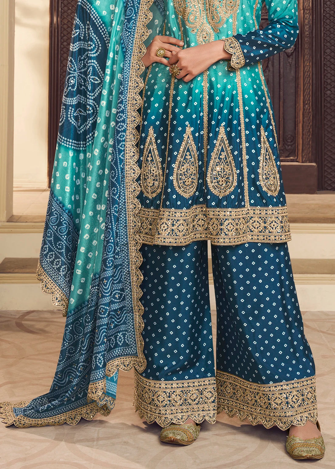 Blue Silk Salwar Kameez with Intricate Motifs Design and Heavy golden thread embroidery Work
