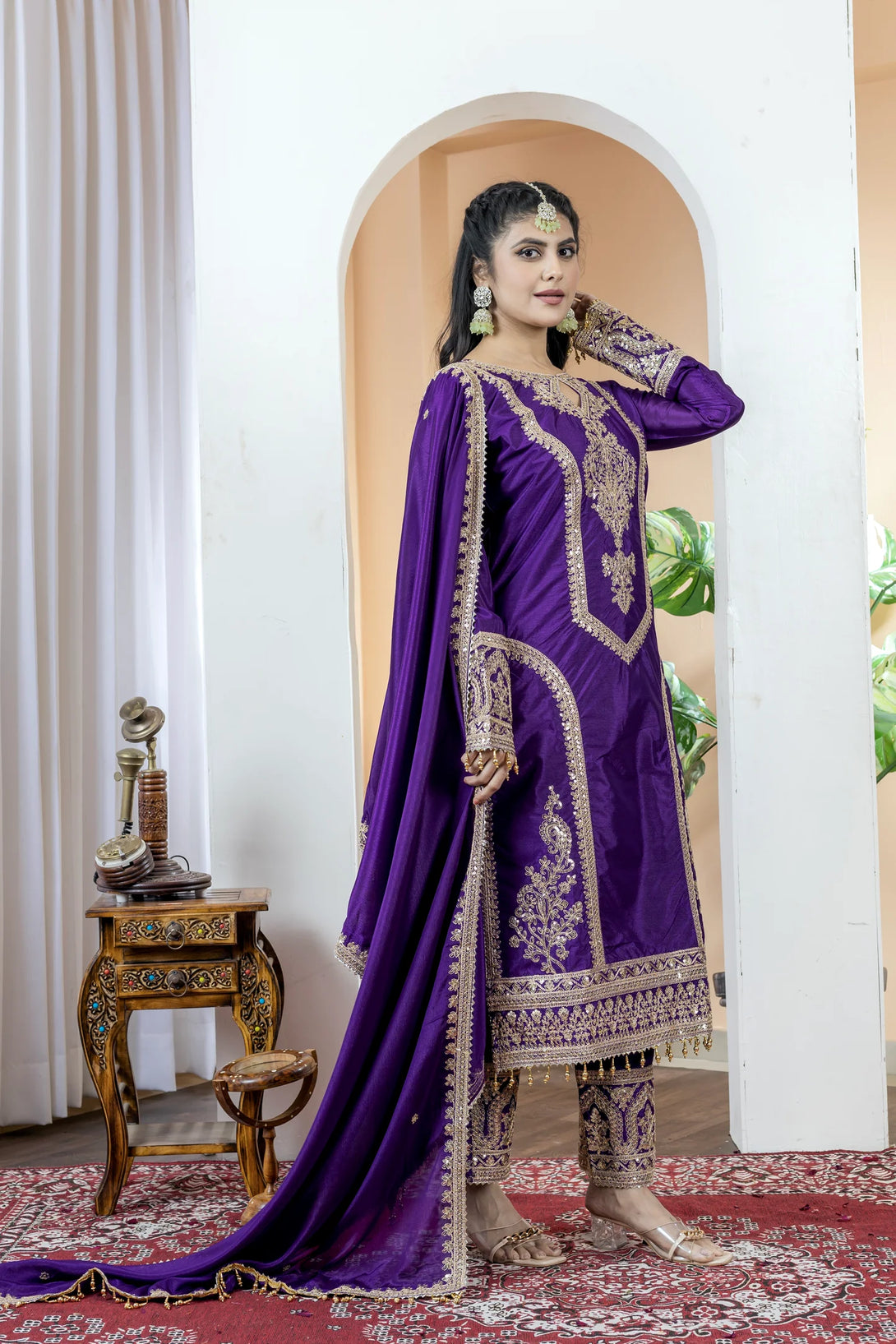 Dark Purple Silk Salwar Kameez showcasing Embroidery and Motifs with Coding Dori Work
