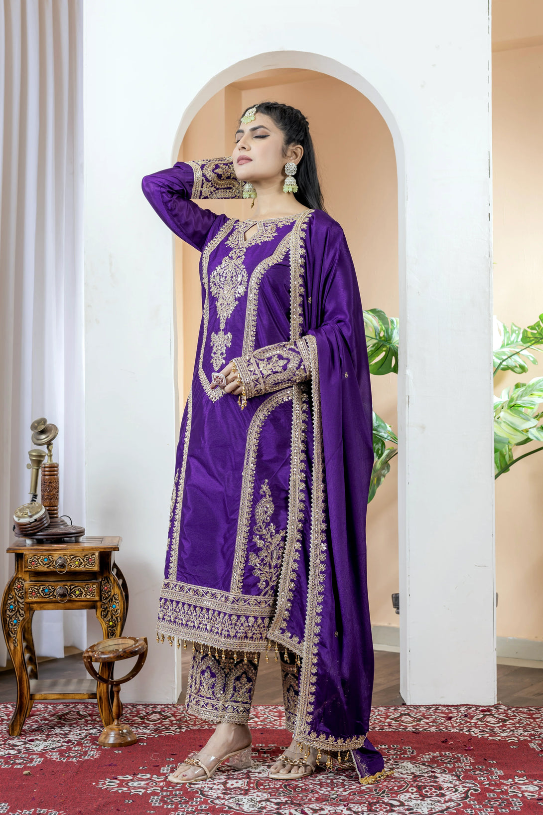 Dark Purple Silk Salwar Kameez showcasing Embroidery and Motifs with Coding Dori Work
