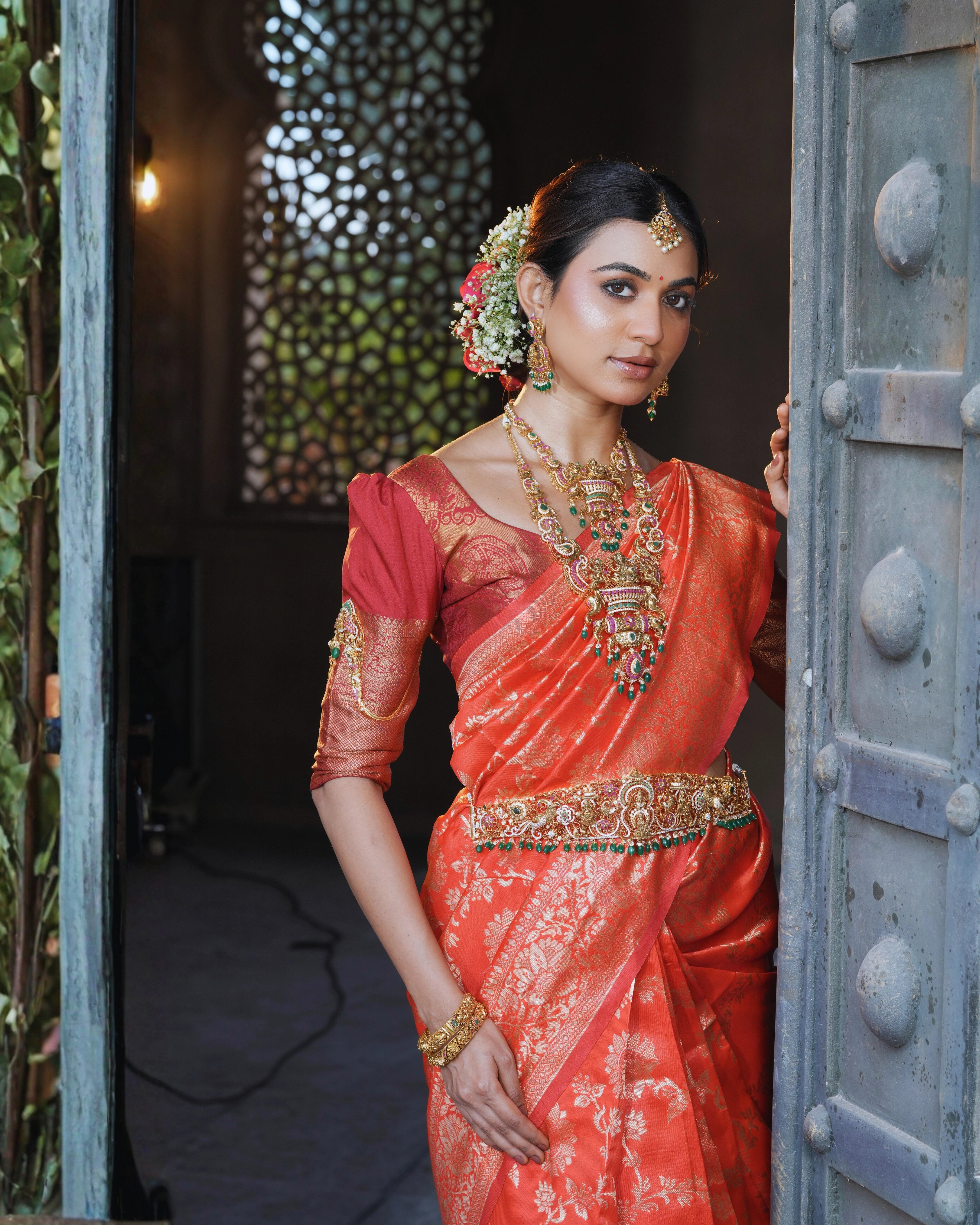 Orange Silk Saree with All-over Golden Zari Floral Weaving with Matching Blouse