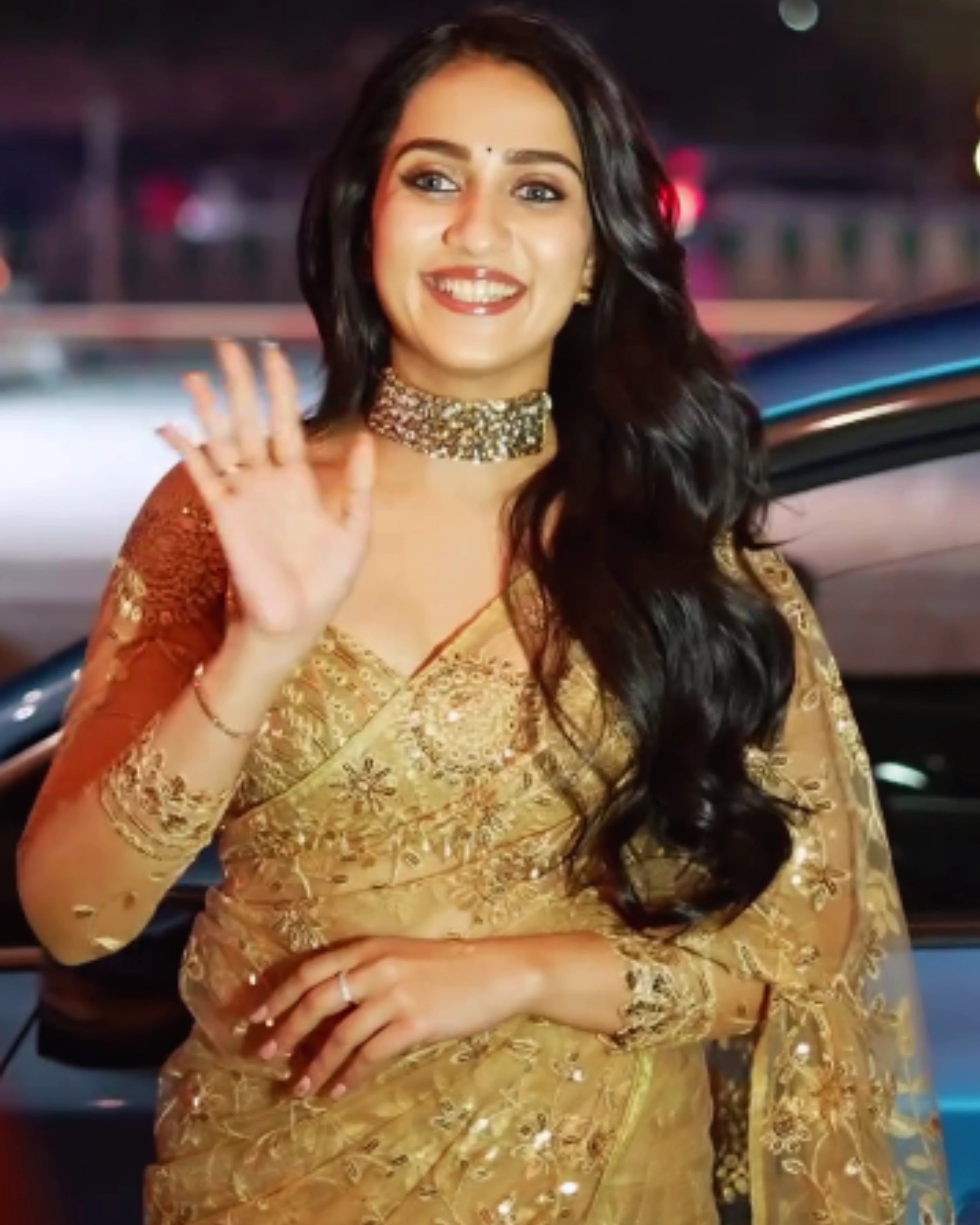 Gold Shimmer Sequin Net Saree with All Over Floral Thread Work and Full Sleeves Silk Blouse