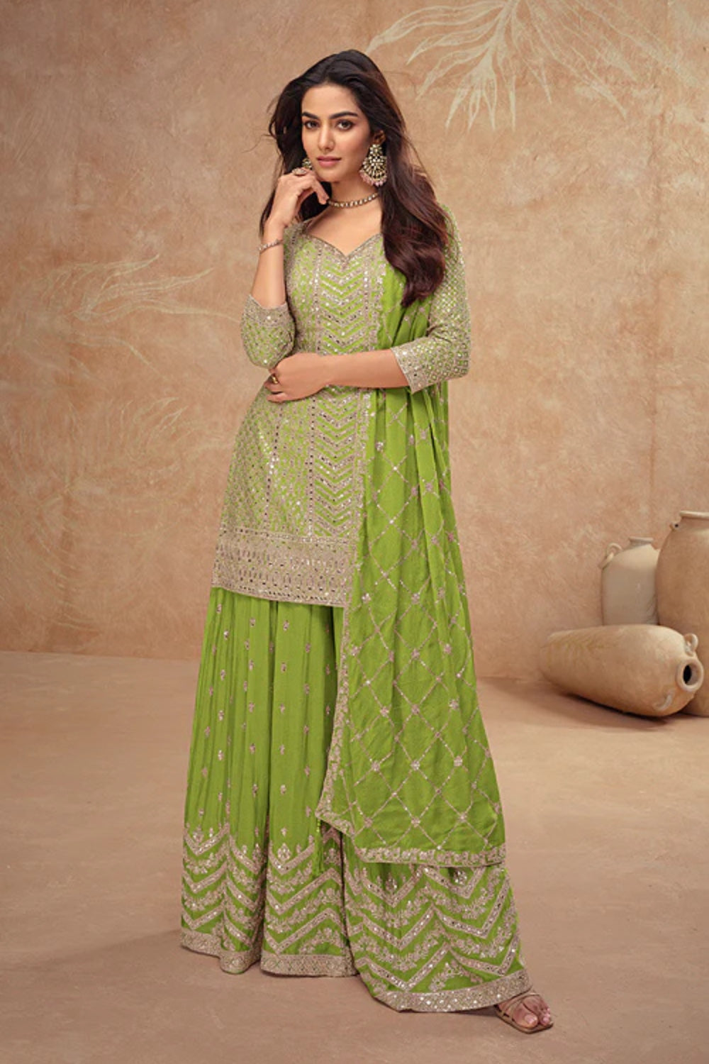 Green Georgette Salwar Kameez featuring Chevron Pattern with Sequin and Motif Design
