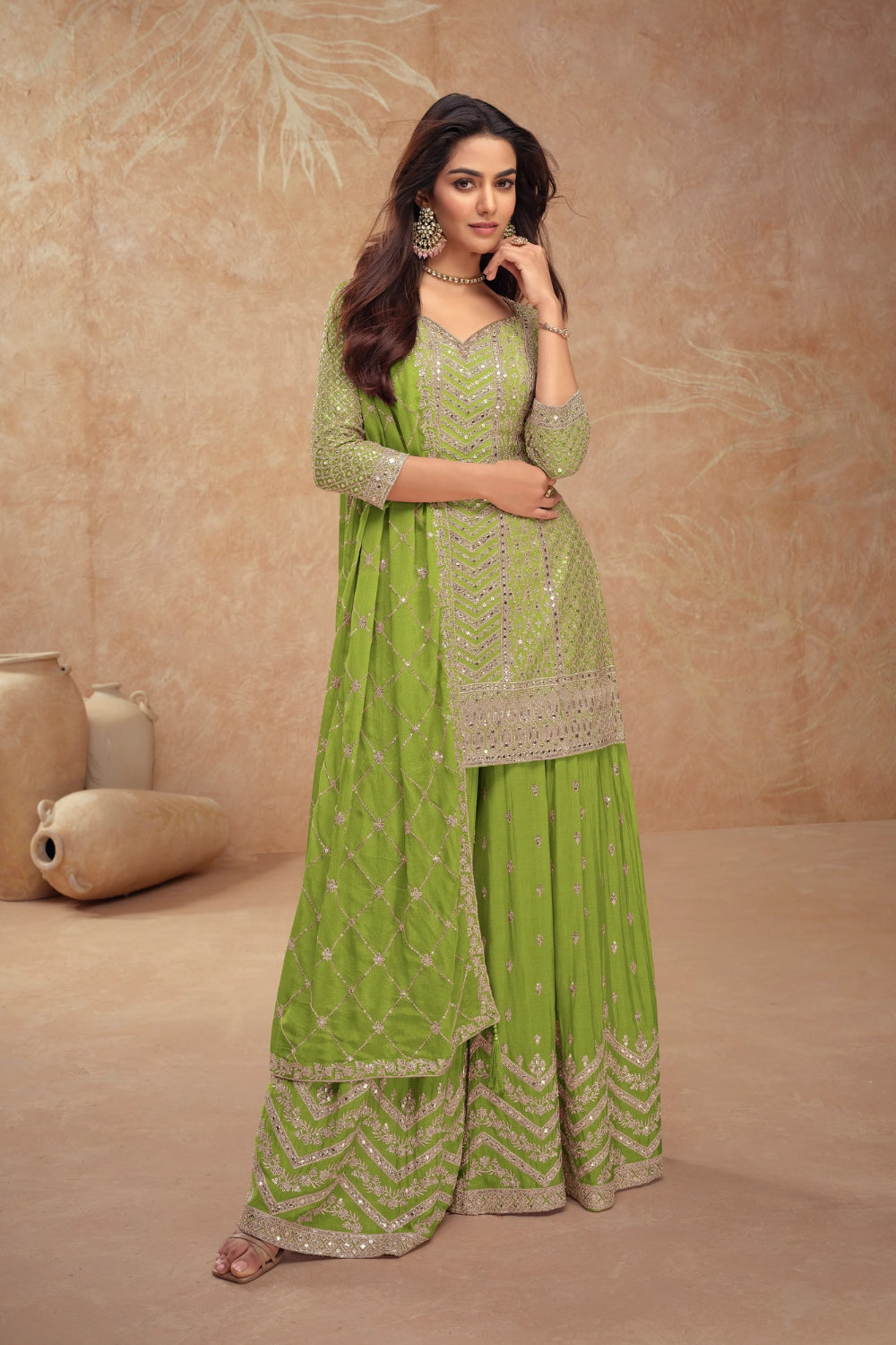 Green Georgette Salwar Kameez featuring Chevron Pattern with Sequin and Motif Design
