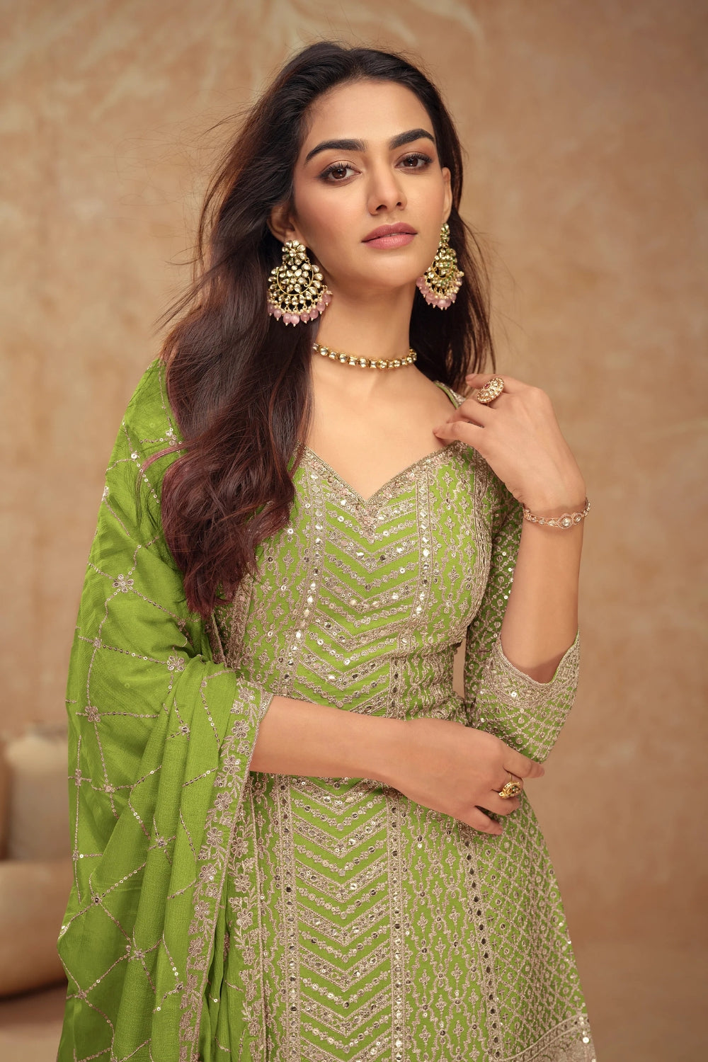 Green Georgette Salwar Kameez featuring Chevron Pattern with Sequin and Motif Design