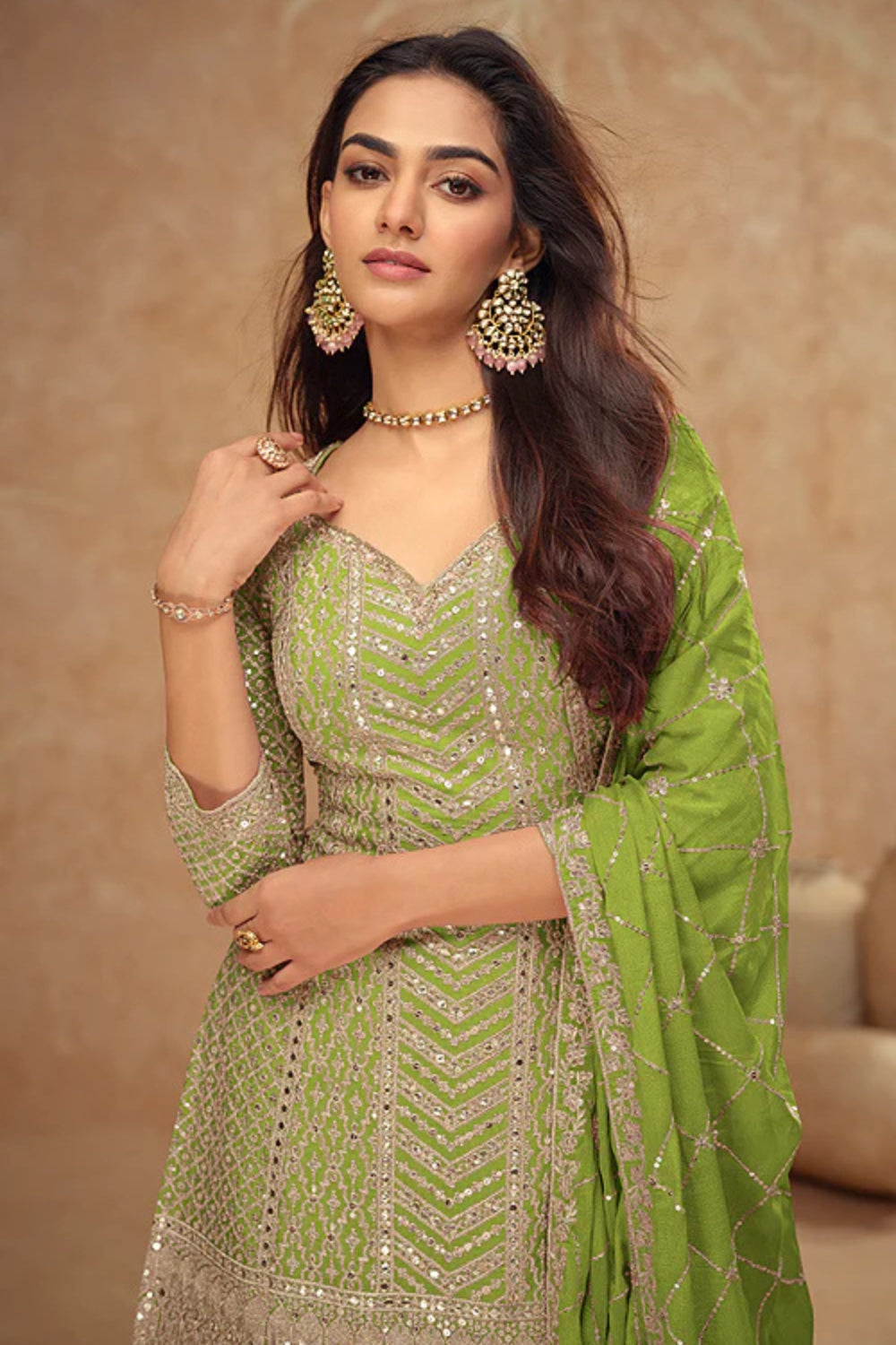 Green Georgette Salwar Kameez featuring Chevron Pattern with Sequin and Motif Design
