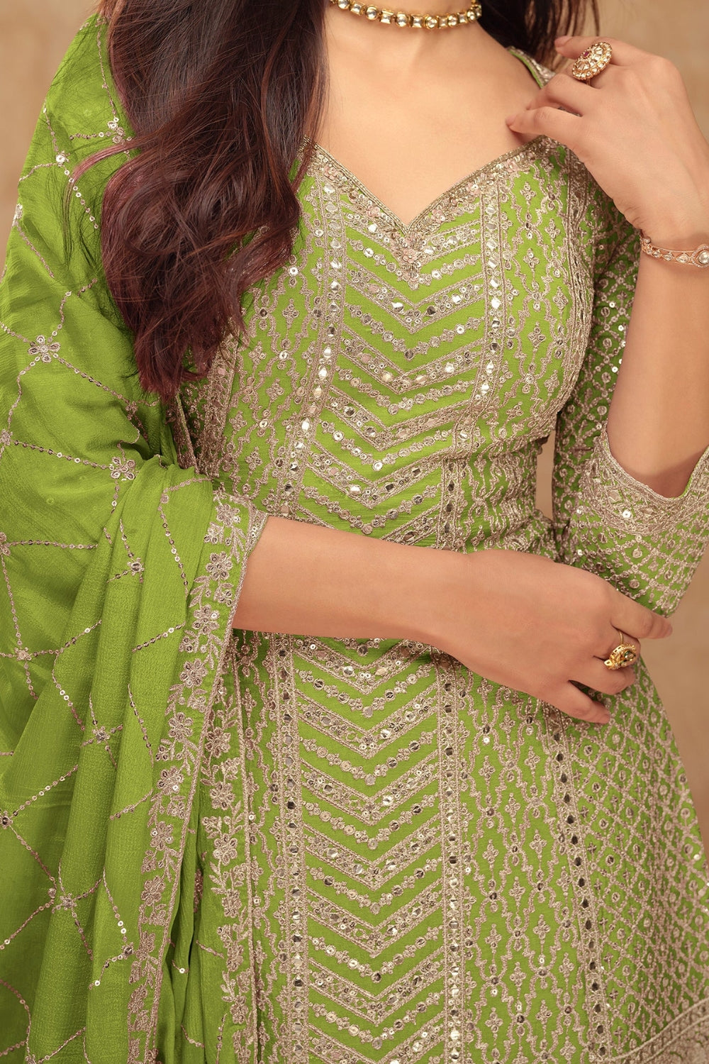 Green Georgette Salwar Kameez featuring Chevron Pattern with Sequin and Motif Design
