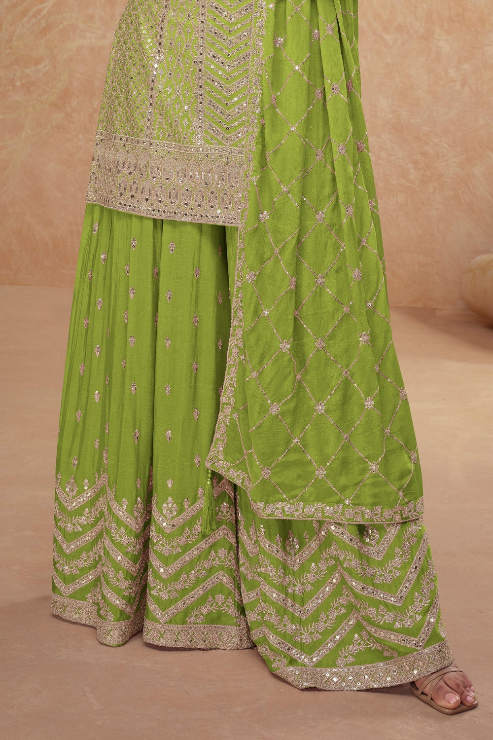 Green Georgette Salwar Kameez featuring Chevron Pattern with Sequin and Motif Design
