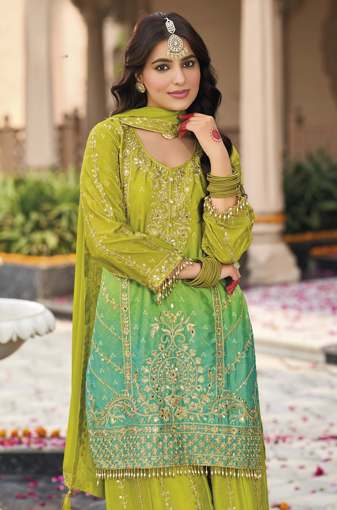 Green Silk Salwar Kameez with Heavy Embroidery Mirror Work
