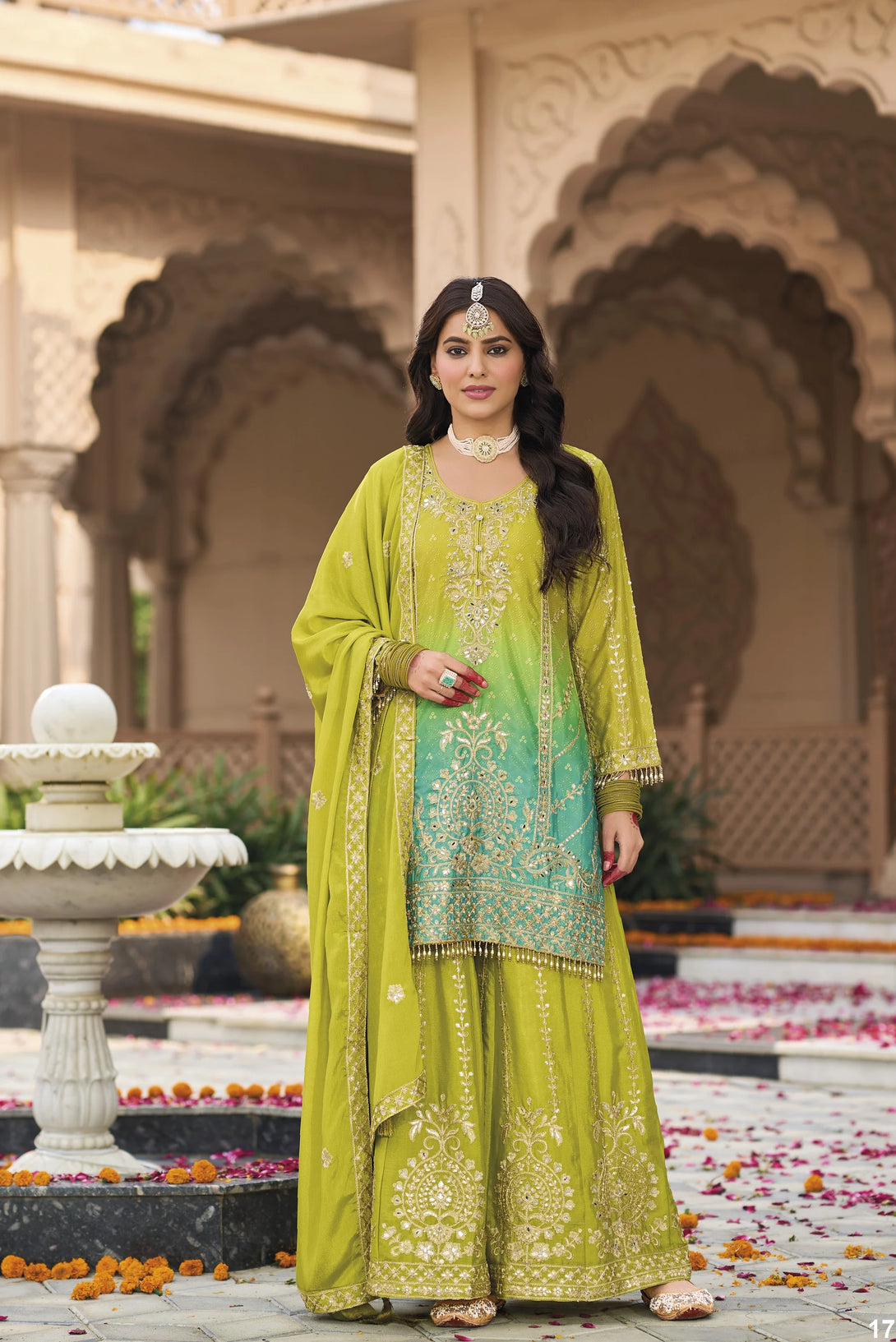 Green Silk Salwar Kameez with Heavy Embroidery Mirror Work
