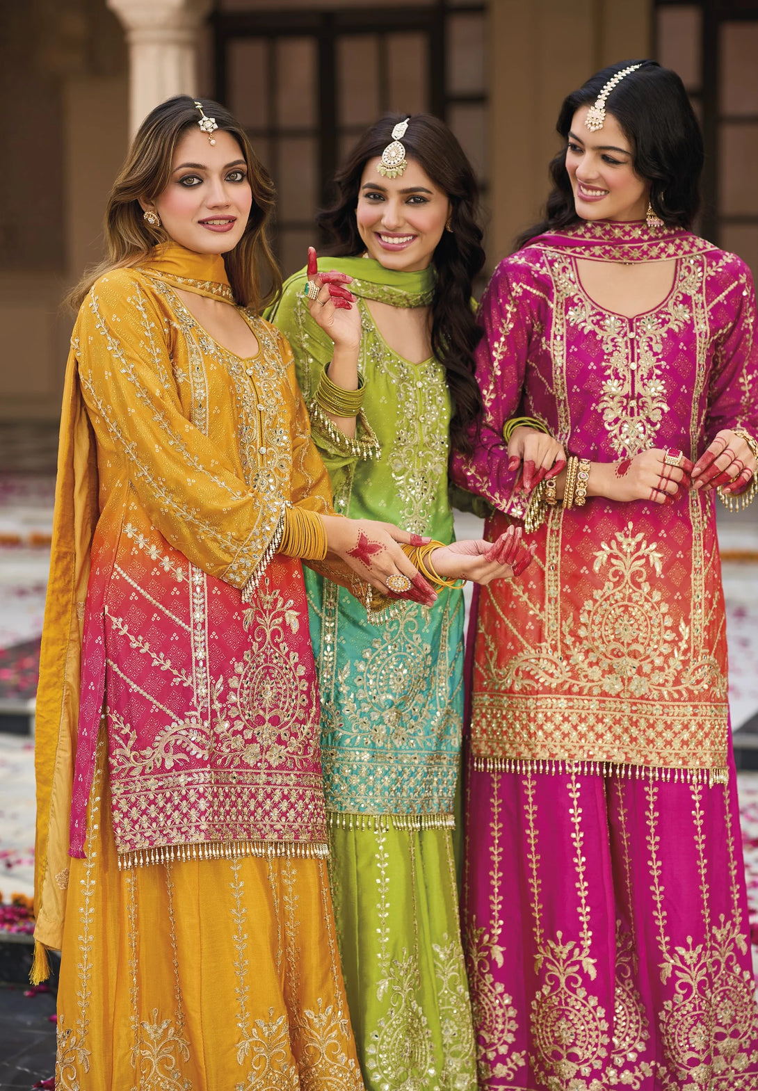 Green Silk Salwar Kameez with Heavy Embroidery Mirror Work
