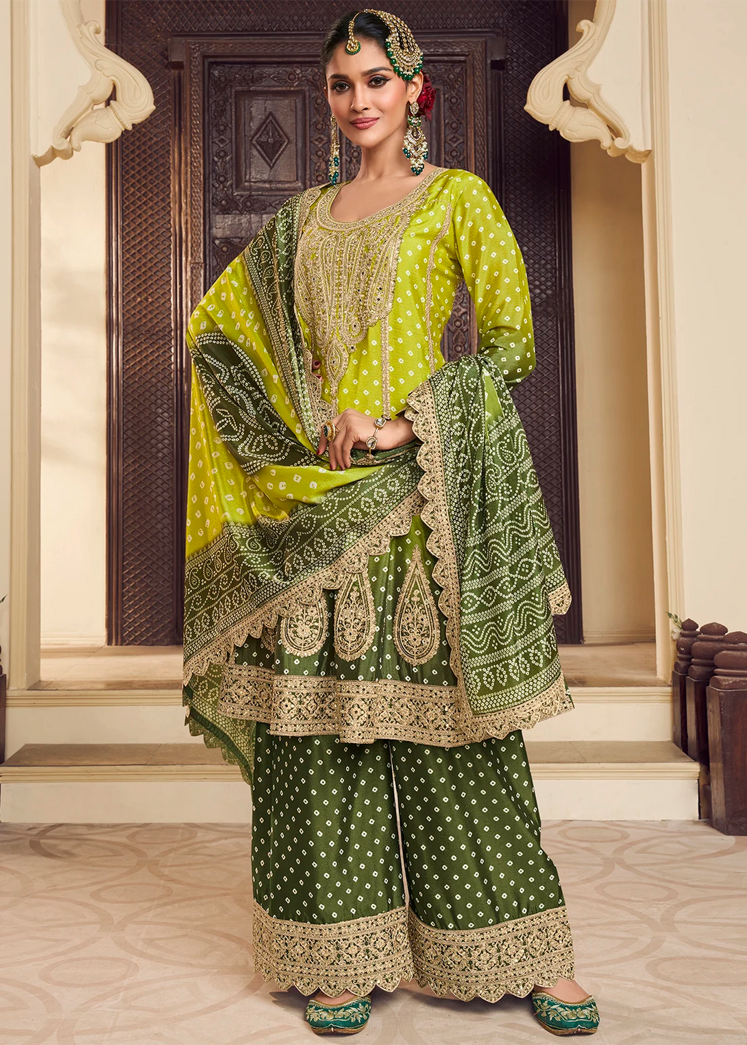Green Silk Salwar Kameez with Intricate Motifs Design and Heavy golden thread embroidery Work
