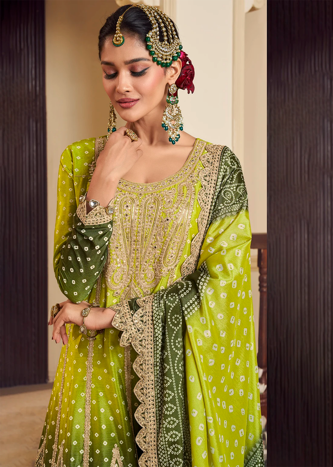 Green Silk Salwar Kameez with Intricate Motifs Design and Heavy golden thread embroidery Work
