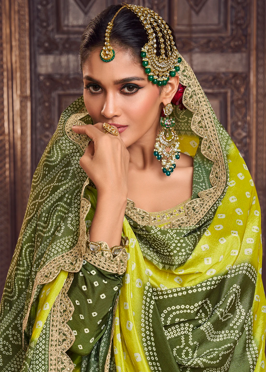 Green Silk Salwar Kameez with Intricate Motifs Design and Heavy golden thread embroidery Work
