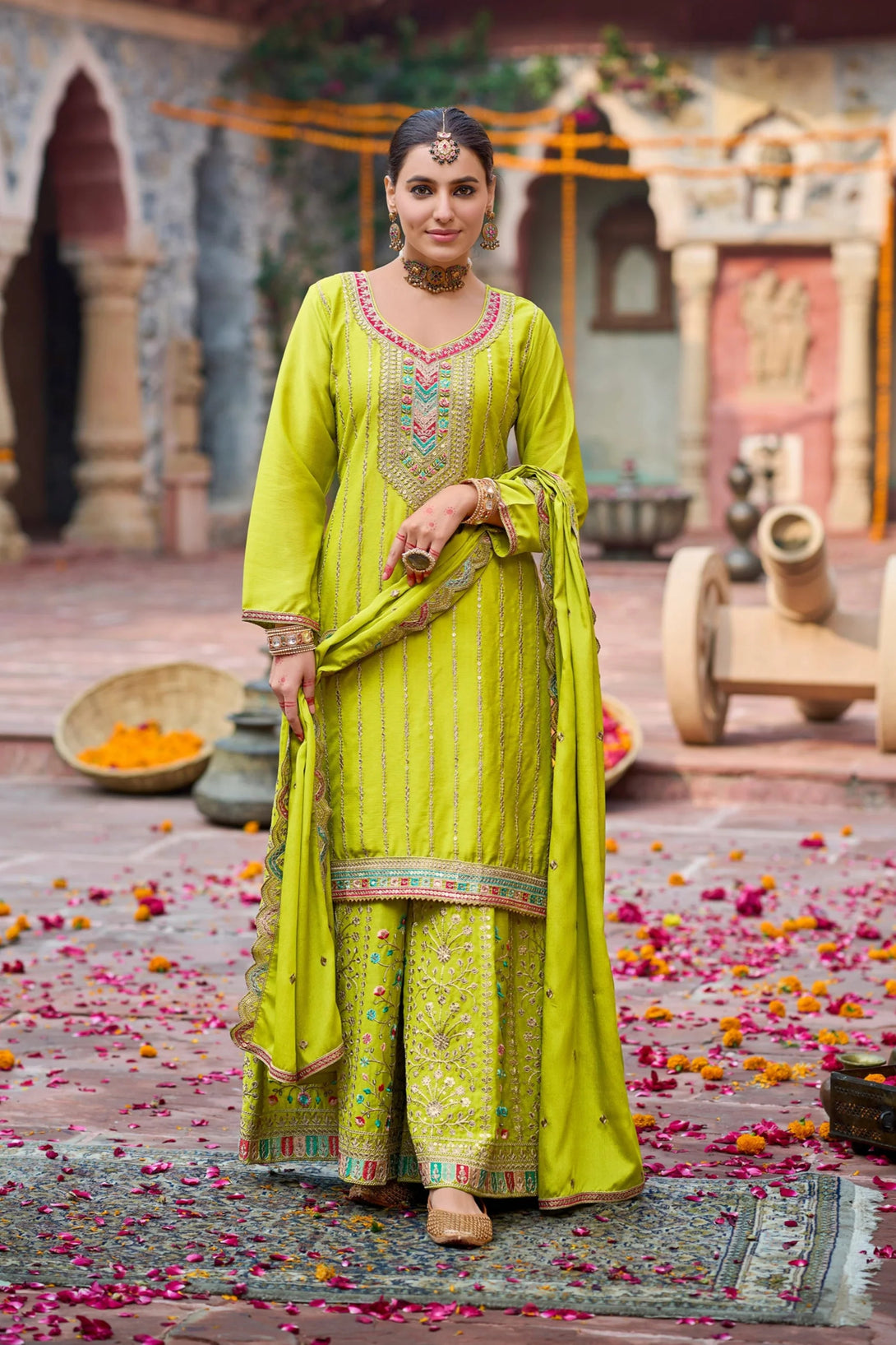 Green Silk Salwar Kameez with Zardozi Embroidery and Mirror Work
